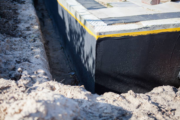 Professional Emergency Waterproofing technician working in Lincroft, NJ